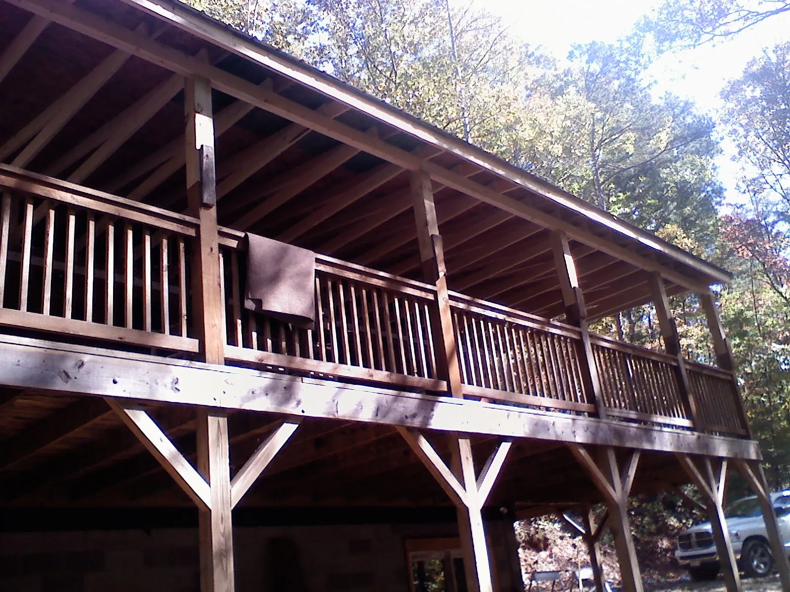 Timber framing under a new elevated porch and deck — Roof Leak Repair in Danby by Roofing Brothers